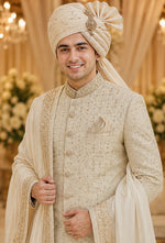 Ivory Creem color Rajwada Sherwani for Would be groom with all over katdaana handwork to give sleek and perfect look on your wedding night .