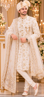 Off white Sherwani with complete jardozi handwork from top to bottom to enrich the groom’s attire on the wedding night with saafa and dupatta wrapped in the most stylish manner with authentic matching broach on the pocket with pocket square .