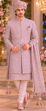 Rajwada rose gold color sherwani with dupatta , saafa , juti , sherwani mala & Kamarbanda to embrace the groom look in the most stylish way possible for your beautiful wedding ceremony. All over tone to tone beads handcrafted of same rose gold color .