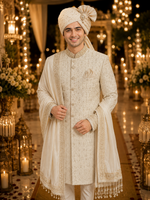 Ivory Creem color Rajwada Sherwani for Would be groom with all over katdaana handwork to give sleek and perfect look on your wedding night .