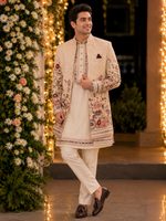 Indo western with kurta and same color trouser attached with a vibrant floral embroidery all over to make the groom or related family person attire most stylish and elegant for the perfect evening look .