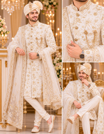 Off white Sherwani with complete jardozi handwork from top to bottom to enrich the groom’s attire on the wedding night with saafa and dupatta wrapped in the most stylish manner with authentic matching broach on the pocket with pocket square .