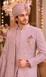 Rajwada rose gold color sherwani with dupatta , saafa , juti , sherwani mala & Kamarbanda to embrace the groom look in the most stylish way possible for your beautiful wedding ceremony. All over tone to tone beads handcrafted of same rose gold color .
