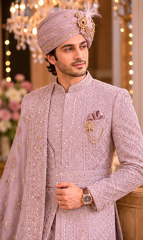 Rajwada rose gold color sherwani with dupatta , saafa , juti , sherwani mala & Kamarbanda to embrace the groom look in the most stylish way possible for your beautiful wedding ceremony. All over tone to tone beads handcrafted of same rose gold color .