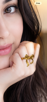 Gold ring amazing design with a floral bow symbol in a unique celebrity inspired same design which can be wear for all time purpose .