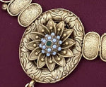 Gold plated anti tarnished imitation necklace with embossed meenakaari earrings sets by Imperial ( A quality product by Kanhaiya Cutpiece ) to make your Wedding look most appealing
