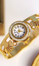 Imperial Golden Anti - Tarnish golden imitation ladies watch with moti ( Pearl ) embossed on the wrist steel gold lackered strap