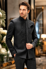 Men Jodhpuri Black Suit with Hand embroidered eagle 🦅 on all over front of the Black Blazer with decent curvilinear fitting to make every man look most appealing on the wedding day