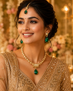 Gold Anti - Tarnish imitation jewellery necklace with earrings having green attractive stone embossed in both tuffs and shiftable necklace pendant